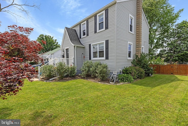 view of front of property with a chimney