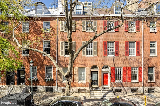 1207 Spruce St Unit 301, Philadelphia, PA 19107 - view of property featuring brick siding and entry steps