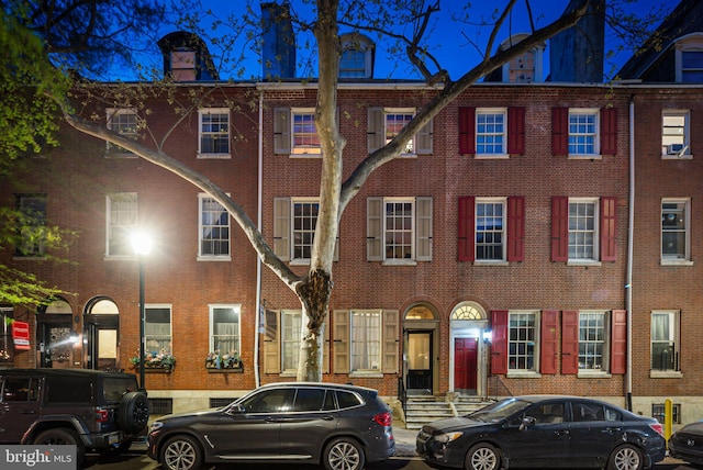1207 Spruce St Unit 301, Philadelphia, PA 19107 - view of front of home featuring a chimney and brick siding