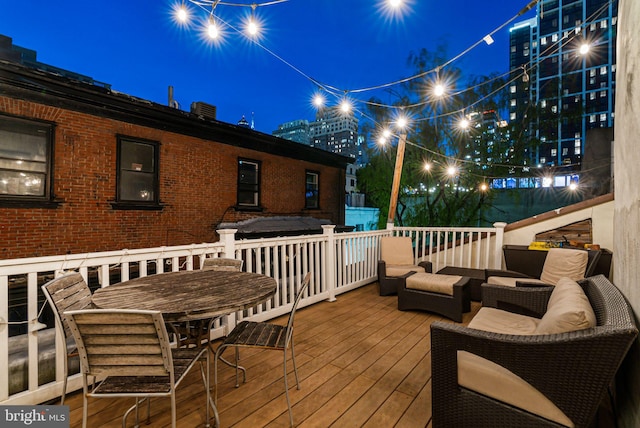 1207 Spruce St Unit 301, Philadelphia, PA 19107 - deck at twilight with an outdoor hangout area and outdoor dining space