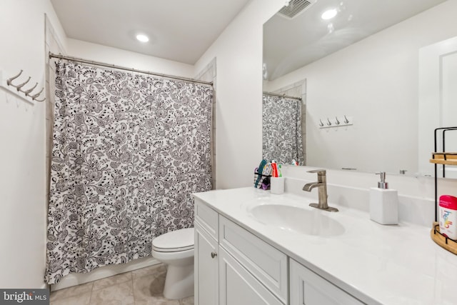 bathroom with tile patterned floors, toilet, visible vents, recessed lighting, and vanity