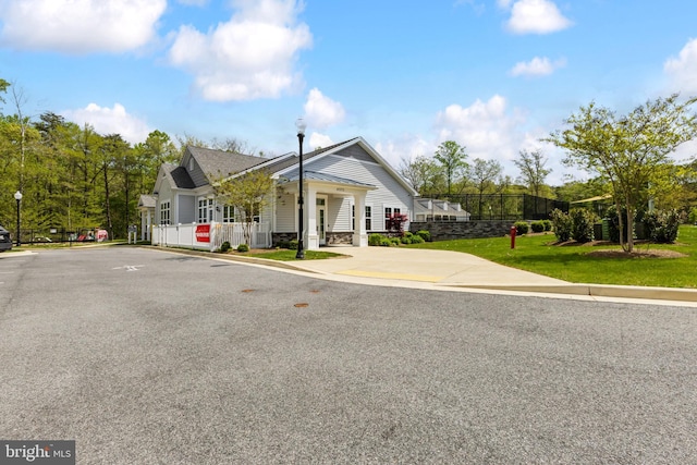 view of front of home with fence