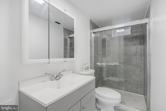 647 Emerson St NE, Washington, DC 20017 - full bath featuring vanity, toilet, and a stall shower