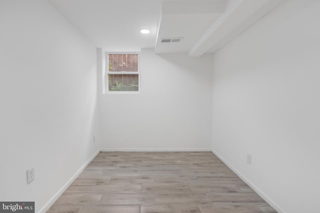 647 Emerson St NE, Washington, DC 20017 - empty room with baseboards, wood finished floors, and visible vents