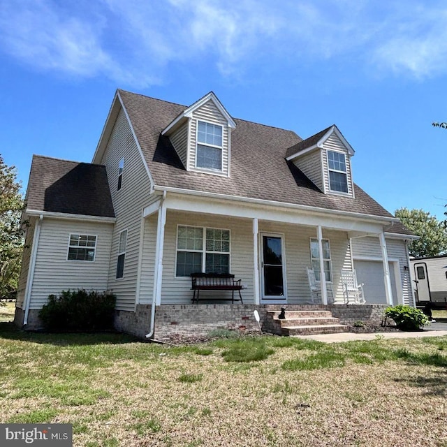 10037 Grapevine Rd, Mardela Springs, MD 21837 - cape cod-style house featuring covered porch, a front lawn, an attached garage, and a shingled roof