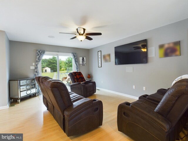 10037 Grapevine Rd, Mardela Springs, MD 21837 - living area featuring a ceiling fan, light wood-type flooring, and baseboards