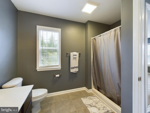 10037 Grapevine Rd, Mardela Springs, MD 21837 - bathroom with toilet, a shower with shower curtain, baseboards, and vanity