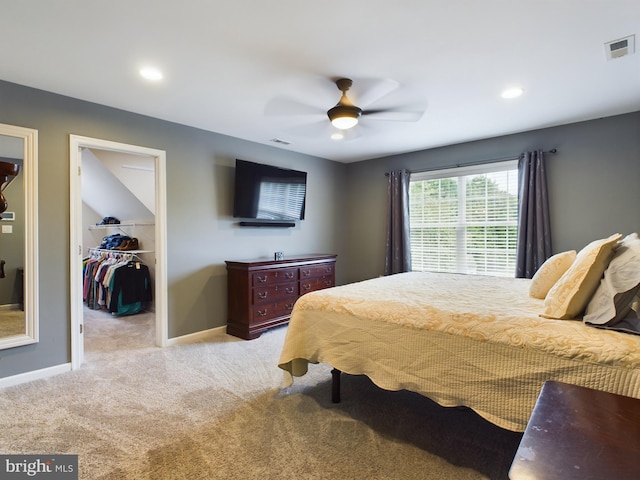 10037 Grapevine Rd, Mardela Springs, MD 21837 - bedroom featuring light carpet, a walk in closet, baseboards, a closet, and ceiling fan