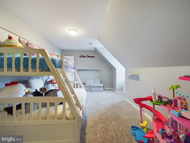10037 Grapevine Rd, Mardela Springs, MD 21837 - carpeted bedroom featuring baseboards and vaulted ceiling
