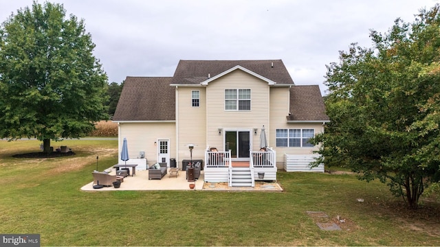 10037 Grapevine Rd, Mardela Springs, MD 21837 - back of property with a yard, a patio area, an outdoor living space, and a wooden deck