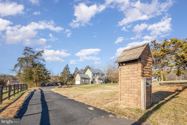 view of street featuring driveway