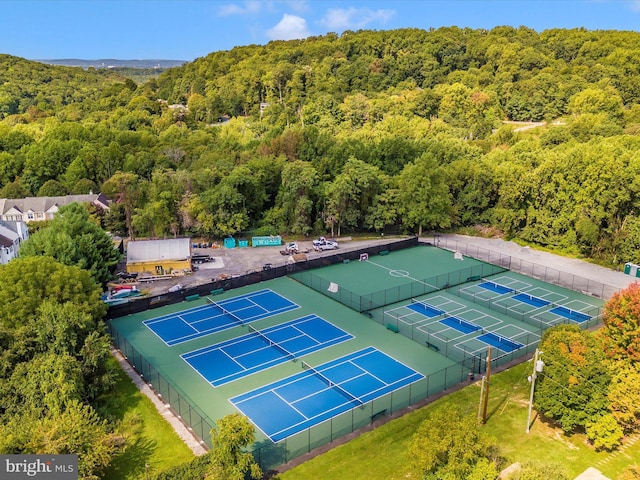 drone / aerial view of a heavily wooded area