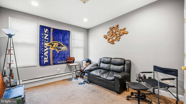 sitting room featuring carpet, recessed lighting, and a baseboard radiator