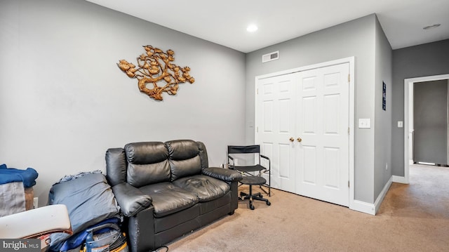 living area featuring recessed lighting, carpet floors, visible vents, and baseboards