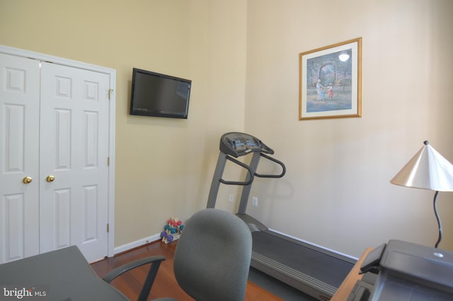 12708 Found Stone Rd Unit 3-302, Germantown, MD 20876 - workout room featuring wood finished floors and baseboards