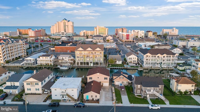 bird's eye view with a water view