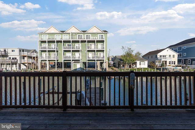 wooden deck with a residential view