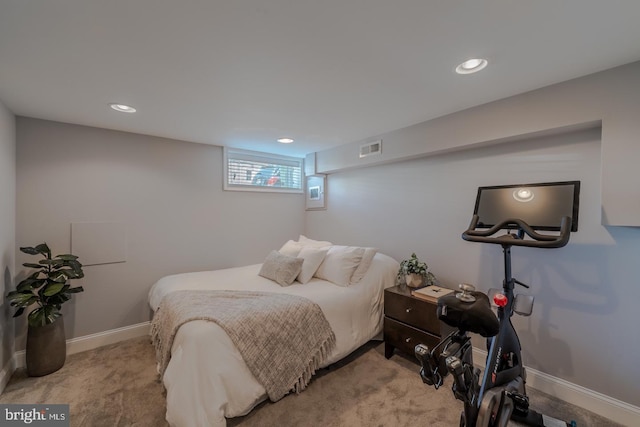 bedroom with carpet floors, recessed lighting, and visible vents