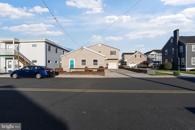 view of road featuring sidewalks and a residential view