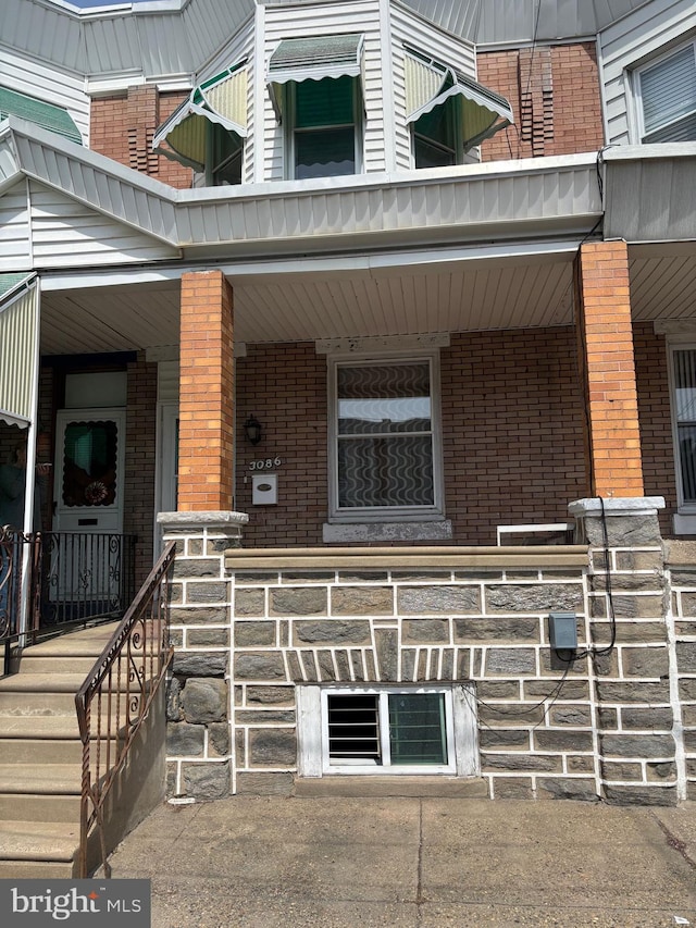 3086 Cedar St, Philadelphia, PA 19134 - entrance to property featuring brick siding and covered porch