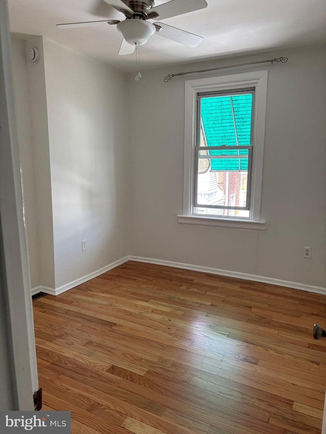 3086 Cedar St, Philadelphia, PA 19134 - empty room featuring baseboards, a ceiling fan, and wood finished floors