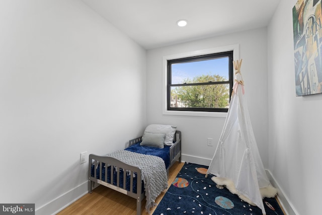 5123 8th St NW, Washington, DC 20011 - bedroom with baseboards, wood finished floors, and recessed lighting
