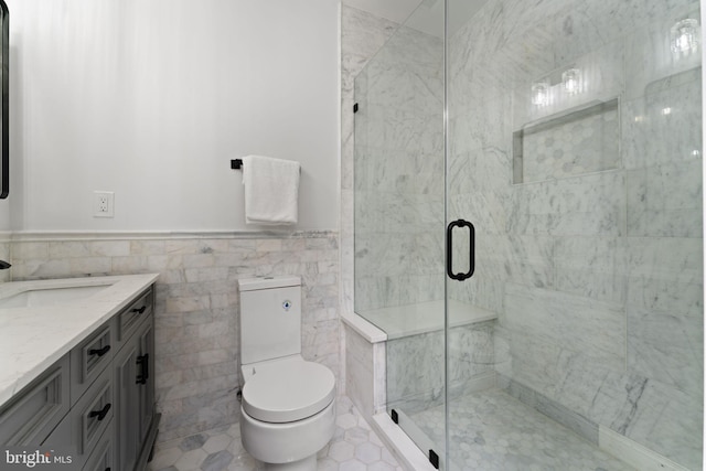5123 8th St NW, Washington, DC 20011 - full bath with toilet, vanity, a wainscoted wall, and a stall shower