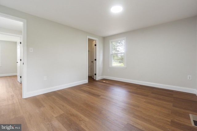 115 Pates Dr, Fort Washington, MD 20744 - empty room with wood finished floors and baseboards