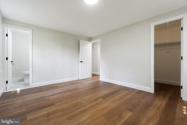115 Pates Dr, Fort Washington, MD 20744 - unfurnished bedroom with attic access, a spacious closet, wood finished floors, and baseboards