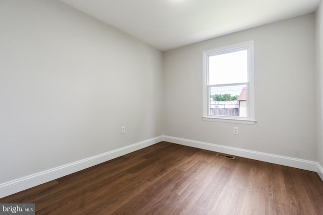 115 Pates Dr, Fort Washington, MD 20744 - spare room featuring baseboards and dark wood finished floors