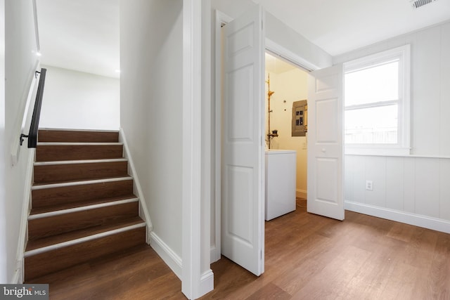115 Pates Dr, Fort Washington, MD 20744 - staircase featuring washer / clothes dryer, wood finished floors, and electric panel