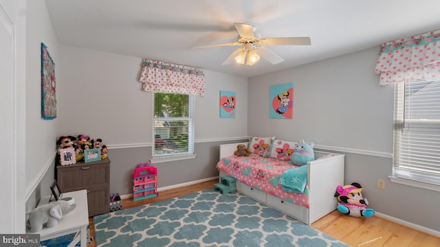 2317 Nantucket Dr, Crofton, MD 21114 - bedroom featuring baseboards, ceiling fan, and wood finished floors