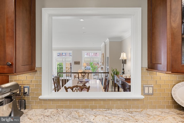 4360 Westover Pl NW, Washington, DC 20016 - interior details featuring decorative backsplash, brown cabinets, and ornamental molding