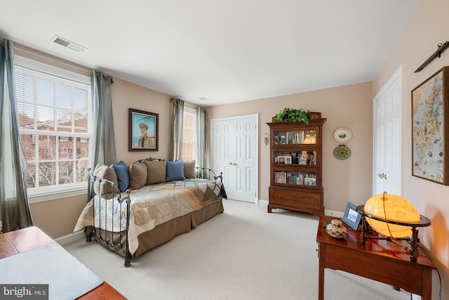 4360 Westover Pl NW, Washington, DC 20016 - bedroom with carpet flooring, baseboards, a closet, and visible vents