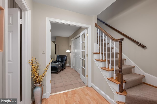 4360 Westover Pl NW, Washington, DC 20016 - staircase featuring baseboards and wood finished floors