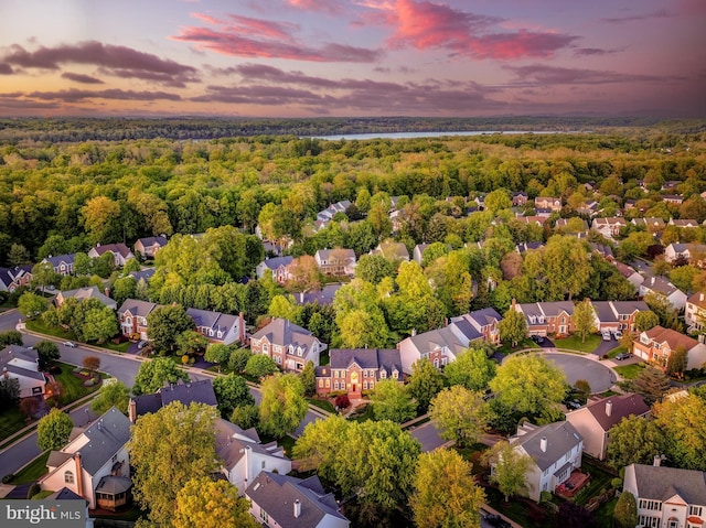 aerial view featuring a residential view and a forest view