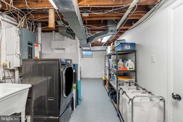 3306 Old Dominion Blvd, Alexandria, VA 22305 - unfinished below grade area with washer / clothes dryer, a sink, and electric panel