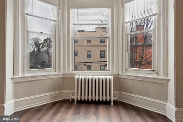3547 N 21st St, Philadelphia, PA 19140 - spare room with radiator and dark wood finished floors
