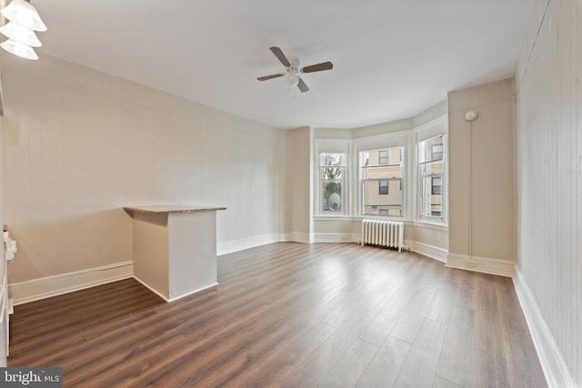 3547 N 21st St, Philadelphia, PA 19140 - interior space with radiator heating unit, ceiling fan, dark wood finished floors, and baseboards
