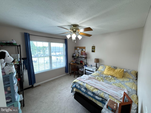 1175 Brook Ct, Front Royal, VA 22630 - bedroom featuring light carpet, a textured ceiling, ceiling fan, and baseboards