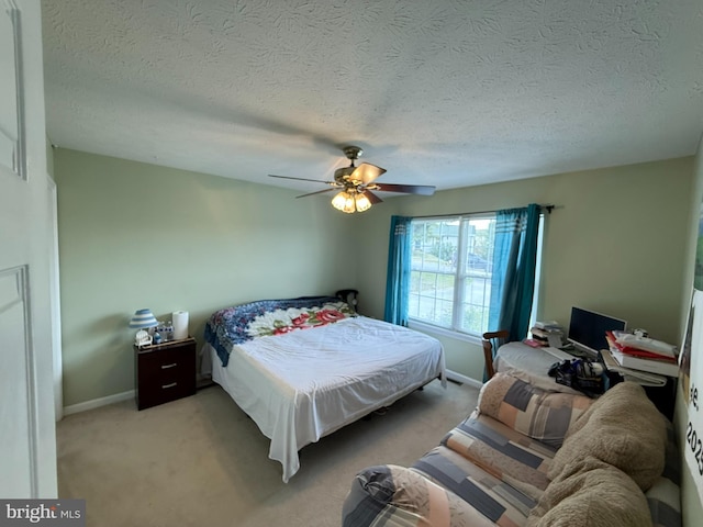 1175 Brook Ct, Front Royal, VA 22630 - bedroom featuring a textured ceiling, a ceiling fan, light colored carpet, and baseboards