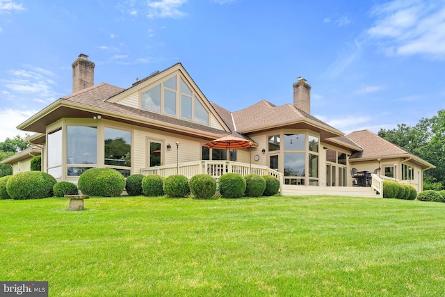 18291 Calumet Ln, Bluemont, VA 20135 - rear view of property featuring a chimney, a wooden deck, and a yard