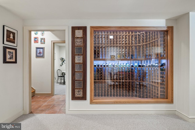 18291 Calumet Ln, Bluemont, VA 20135 - wine area with baseboards, tile patterned flooring, and carpet flooring