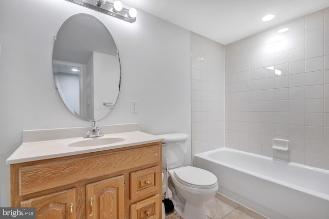 full bathroom with tile patterned flooring, toilet, and vanity