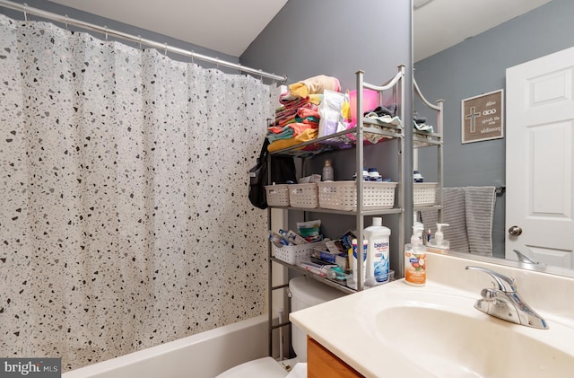 bathroom featuring shower / tub combo with curtain, vanity, and toilet