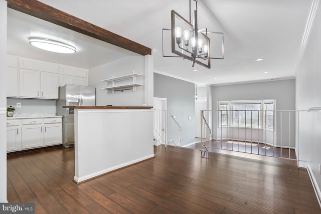 6033 Sweet Dale Ct, Springfield, VA 22152 - kitchen featuring stainless steel refrigerator with ice dispenser, white cabinets, dark wood-type flooring, pendant lighting, and a chandelier