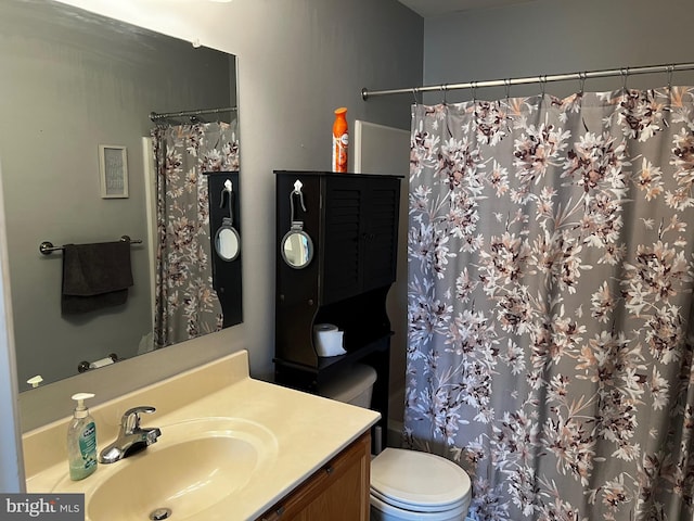 209 Preston Ln, Clayton, DE 19938 - bathroom featuring a shower with shower curtain, toilet, and vanity