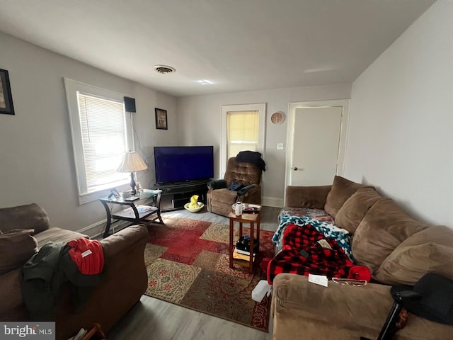 611 Truitt St, Salisbury, MD 21804 - living area with a wealth of natural light, visible vents, and wood finished floors