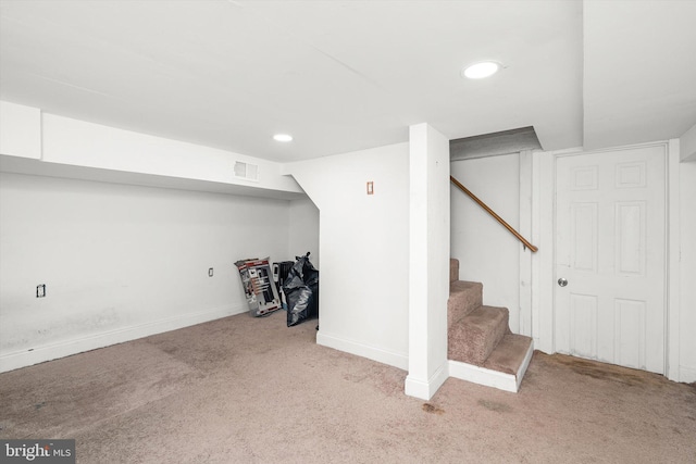 finished basement with recessed lighting, stairs, carpet floors, baseboards, and visible vents