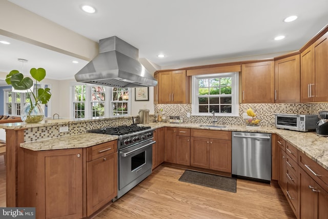 4 Rooftree Rd, Cherry Hill, NJ 08003 - kitchen with appliances with stainless steel finishes, island range hood, a sink, a peninsula, and light wood-style floors
